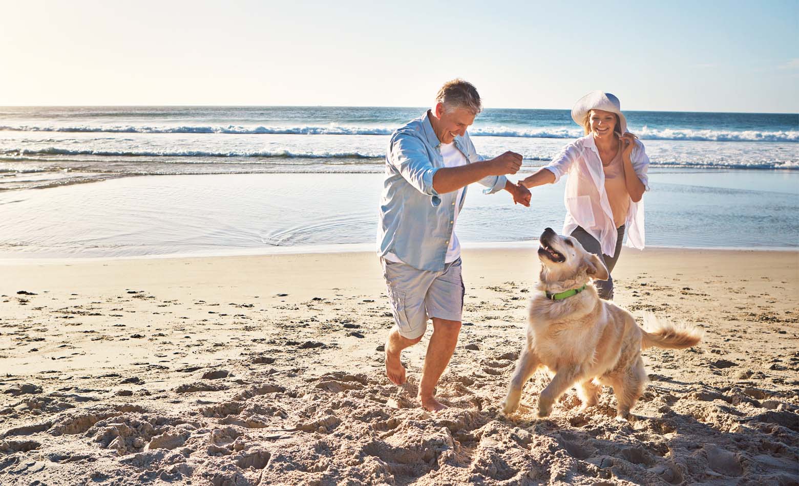 image-private-family-retired-couple-on-beach-with-dog-image-1-1